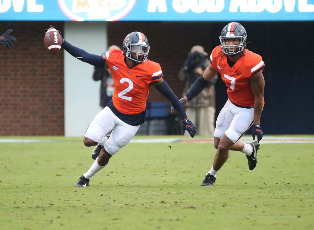 Virginia safety De'Vante Cross celebrates an interception against Duke.